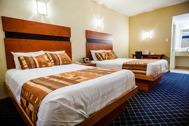 غرفة بسريرين مزدوجين، American Inn Hotel Suites Delicias 2/4