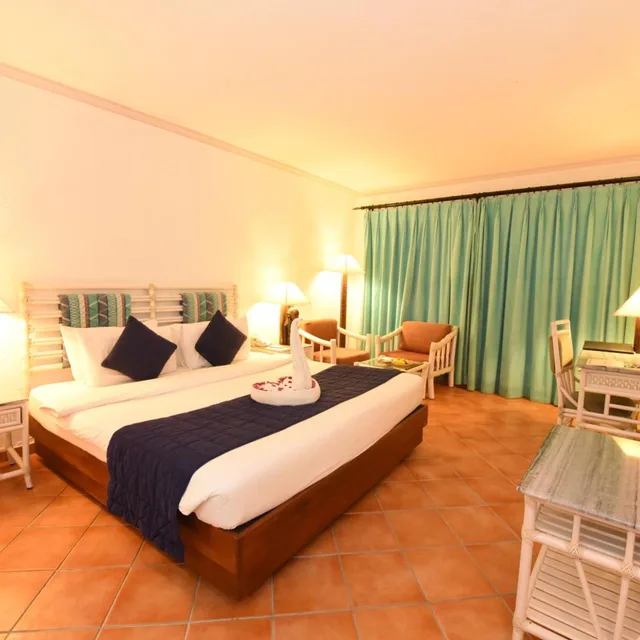 غرفة بسرير مزدوج بإطلالة على الحديقة، Diani Reef Beach Resort and Spa 3/5