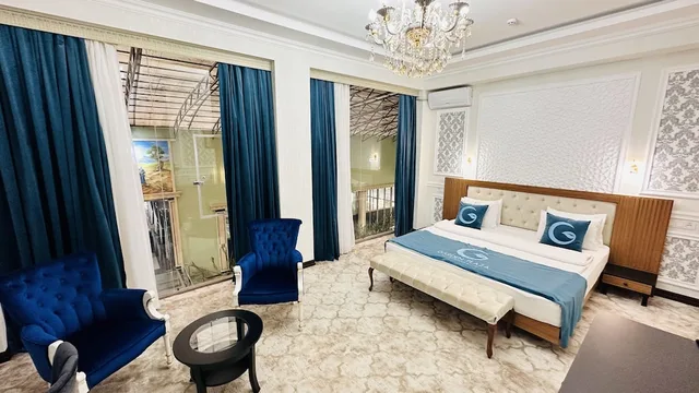 غرفة فاخرة بسرير مزدوج بإطلالة على الحديقة، Garden Plaza Bukhara 1/2