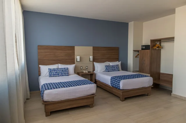 غرفة قياسية بسريرين مزدوجين بإطلالة على المدينة، Ocean View Beach Hotel 1/4