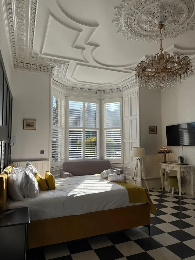 غرفة ديلوكس بسرير مزدوج، The International Guest House 2/4