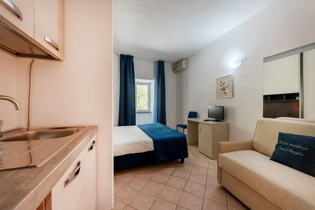 غرفة ثلاثية بفراش فوتون وسرير مزدوج وسرير فردي، Hotel Residence Sant Angelo 2/6