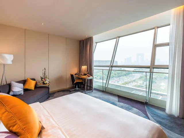غرفة ديلوكس بسرير كينج بإطلالة على البحيرة، Novotel Suzhou Sip 1/10