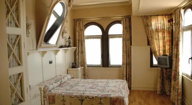 غرفة ثلاثية بسرير مزدوج وسرير فردي، Hotel Juan Carlos I 2/3