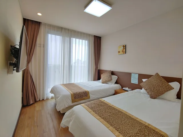 غرفة عائلية بسرير كينج وسرير فردي بإطلالة على البحر، Jeju Ocean Blue Hotel 3/8
