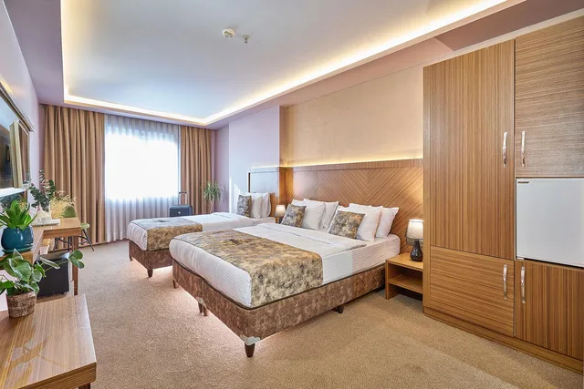 غرفة عائلية بسرير كينج وسريرين منفصلين، Atro Hotel 1/1