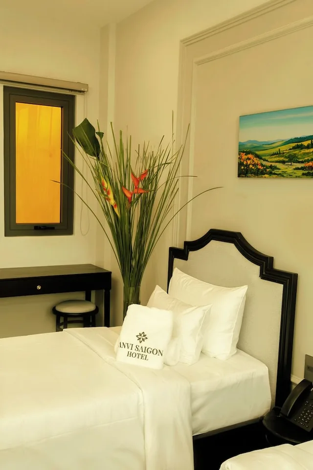 غرفة تنفيذية ثلاثية بسرير مزدوج وسرير فردي، Anvi Saigon Boutique Hotel 3/8