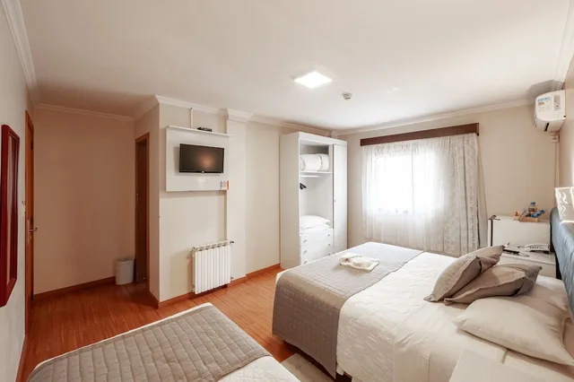 غرفة قياسية بسرير مزدوج وسرير فردي، Hotel Bertoluci 5/10