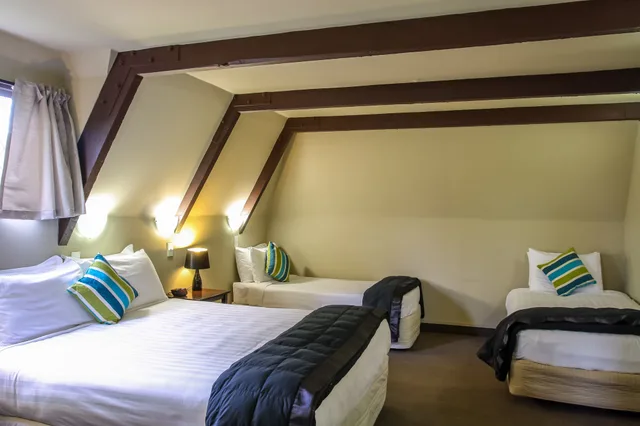 جناح كومفورت بسرير كينج بغرفة نوم واحدة، Camelot Motor Lodge 1/6