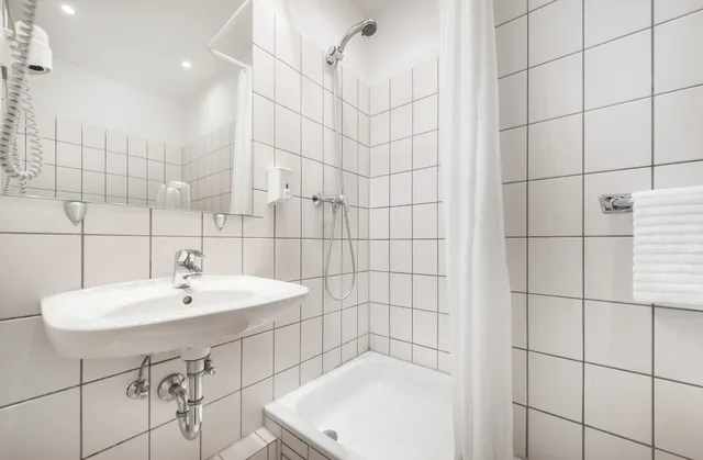 غرفة مفردة بسرير فردي، Central Hotel 3/3