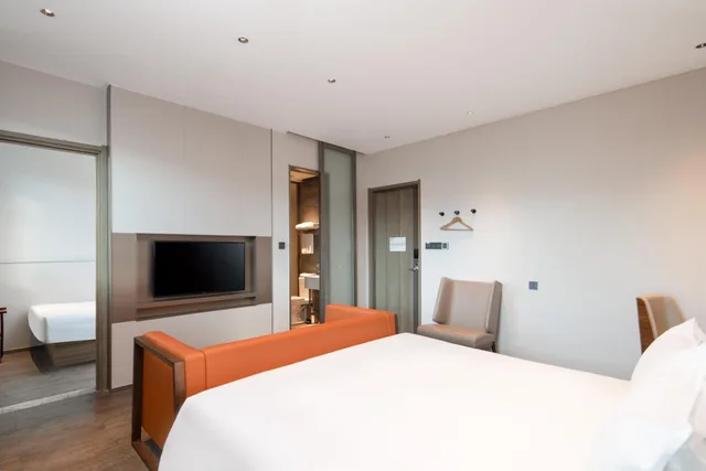 Deluxe, Double Bed, No Window، Meichen Hotel 1/8