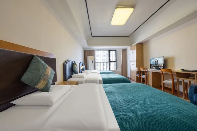 غرفة بزنس ثلاثية بسريرين مزدوجين، Home Inn Huayi Apartment 5/10