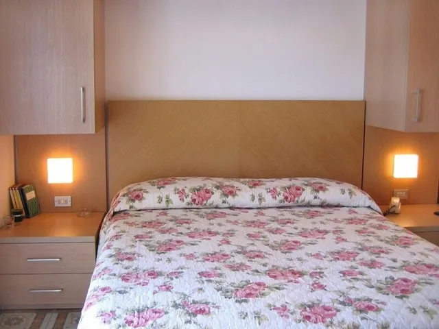 غرفة عائلية بسرير كينج وسرير بطابقين، Hotel Olimpia 1/3