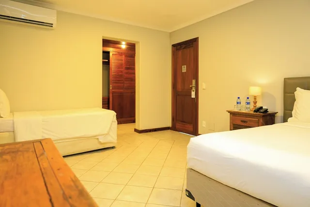 Room, Triple, 1 Double and 1 Single Bed, Sea Front, Main Building، Vila Angatu Eco Resort and Spa 3/6