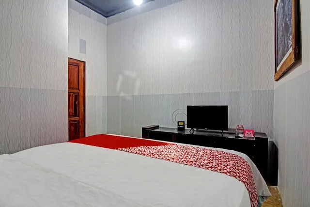 غرفة قياسية بسرير مزدوج، OYO 90358 Poris Residence 3/5