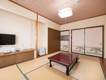 غرفة تقليدية رباعية بسرير فردي في الملحق، Tabist Hotel Yamashiro Onsen 1/1