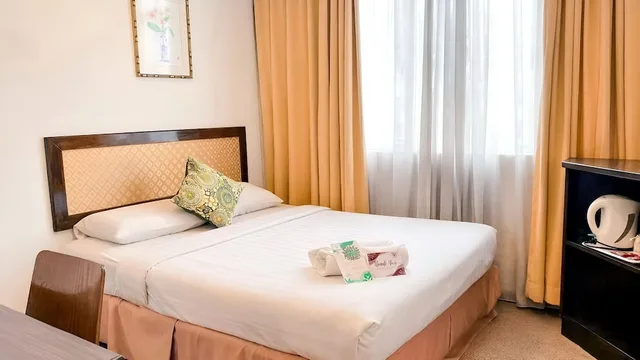 غرفة تنفيذية بسرير كوين، Desa Queenspark Hotel 1/10