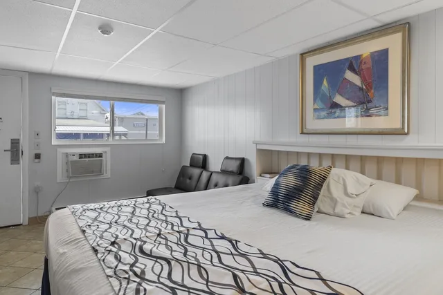 غرفة بفراش فوتون وسرير كينج وسرير فردي، Mt Royal Motel 2/4