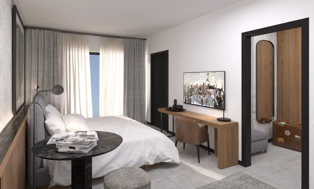 غرفة بريميوم بسرير مزدوج، J Hotel 2/4