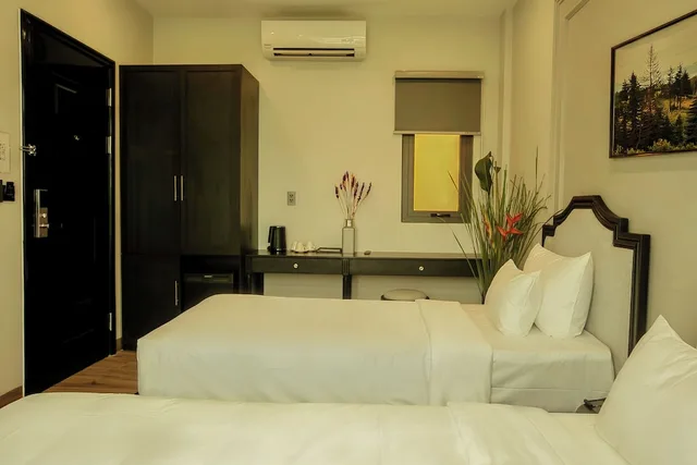 غرفة تنفيذية ثلاثية بسرير مزدوج وسرير فردي، Anvi Saigon Boutique Hotel 4/8