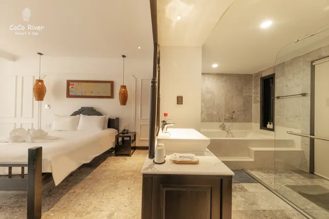 غرفة ديلوكس بسرير مزدوج بإطلالة على الحديقة، Hoi An Coco River Resort Spa 3/3