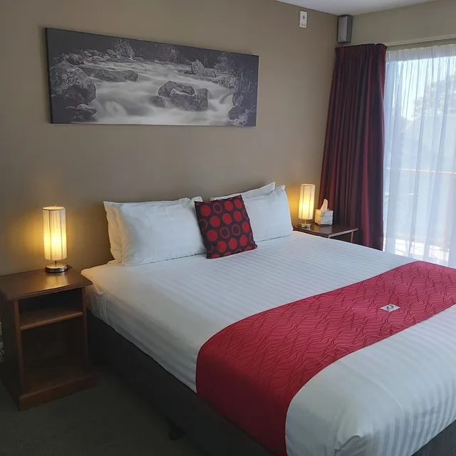 جناح تنفيذي بسرير كينج مع دخول الصالة، Gladstone Motel Nelson 1/5