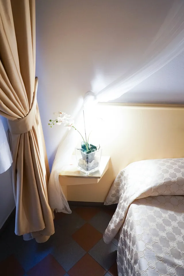 غرفة رباعية بسرير كوين وسريرين منفصلين، Piccolo Hotel Etruria 3/4