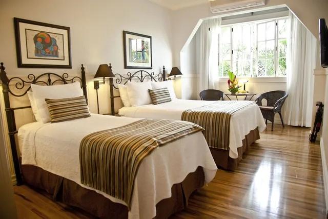 Family Suite, 1 Single and 2 Queen Beds، Hotel Grano de Oro 2/10