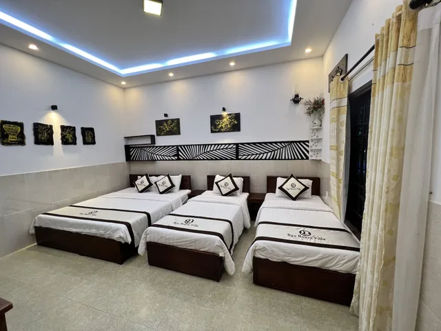 غرفة ديلوكس ثلاثية بسرير كينج وسريرين منفصلين، Ngo House 2 Villa 1/7
