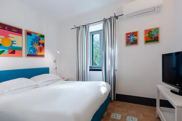 شقة بسريرين كوين، Relais Regina Giovanna 2/5