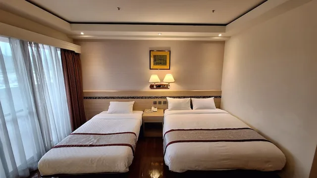 غرفة قياسية ثلاثية بسرير مزدوج وسرير فردي، Cheng Pao Hotel 7/10