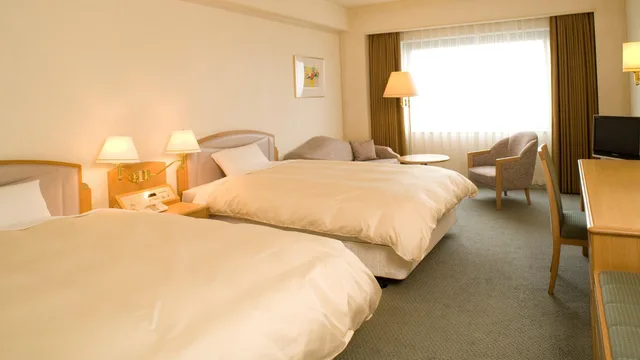 غرفة بسريرين منفصلين مع أريكة، Rihga Royal Hotel Niihama 1/1
