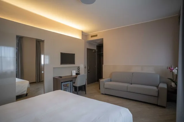 غرفة عائلية رباعية بسرير كوين مع أريكة، Hotel Guerro 2/4