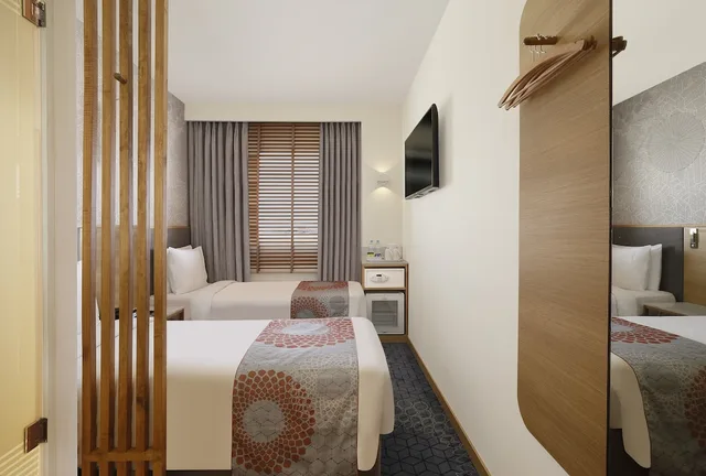غرفة قياسية بسريرين منفصلين في الطابق العلوي، Holiday Inn Express Chennai Omr Thoraipakkam 2/5