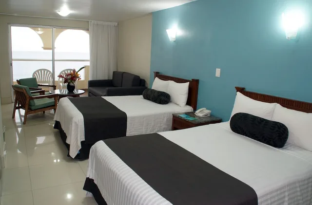 جناح جونيور بسريرين مزدوجين بإطلالة على البحر مع أريكة، Don Pelayo Pacific Beach Hotel 2/4