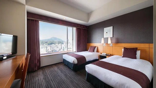 Room, Twin Beds, Night View، Hotel Nikko Oita Oasis Tower 1/2