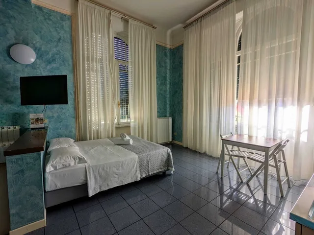 غرفة رباعية، Hotel Soggiorno Athena 4/8