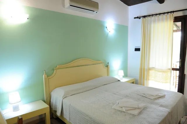 غرفة بانورامية بسرير كوين وسرير فردي مع أريكة، Sa Mola Villa Maria Francesca 1/1