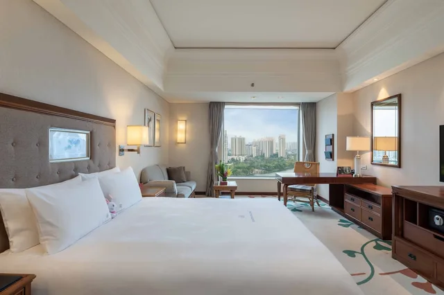غرفة ديلوكس بسرير كينج بإطلالة على النهر، Kande International Hotel Huizhou 1/7