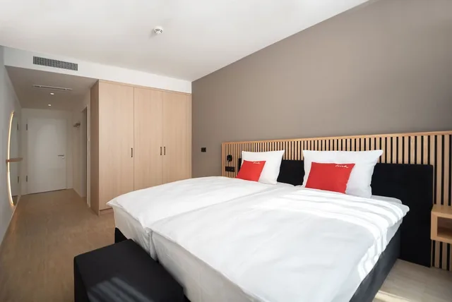 غرفة قياسية بسريرين منفصلين، Tailormade Hotel BAB Bachenbulach 2/4