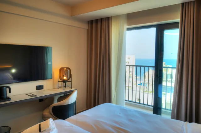 غرفة بسرير مزدوج أو سريرين منفصلين بإطلالة جزئية على البحر، Aste Hotel 1/2