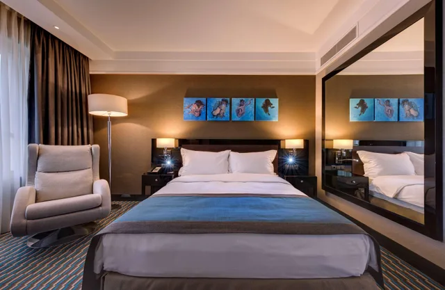 غرفة قياسية بسرير مزدوج أو سريرين منفصلين، Radisson Blu Leogrand Hotel 1/1