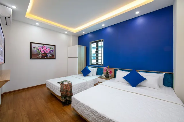 غرفة سوبيريور ثلاثية بسرير مزدوج وسرير فردي، Hanoi Golden Hotel 2/3