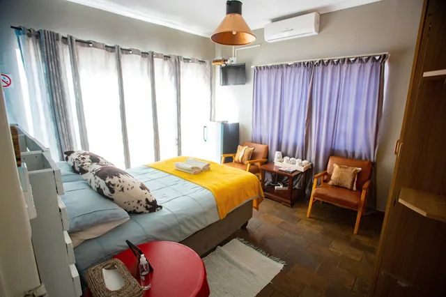 غرفة بسرير مزدوج أو سريرين منفصلين بحمام خاص، Kate's Nest Guesthouse 3/9