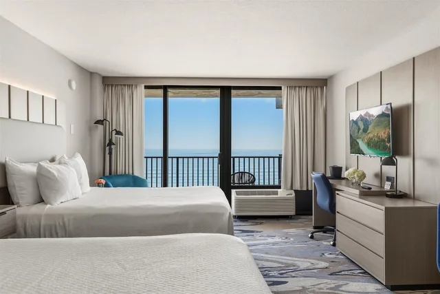 غرفة قياسية بسريرين كوين بإطلالة جزئية على البحر بمطبخ، Nautilus Inn 6/10