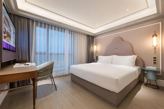 غرفة بريفيليج بسرير كينج وسرير كوين، Mercure Nantong Downtown 2/4