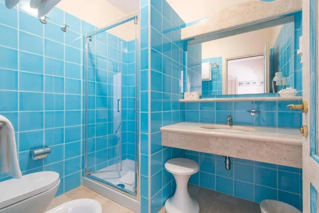 غرفة بسرير مزدوج أو سريرين منفصلين بإطلالة على الحديقة، Hotel Cormorano 2/2
