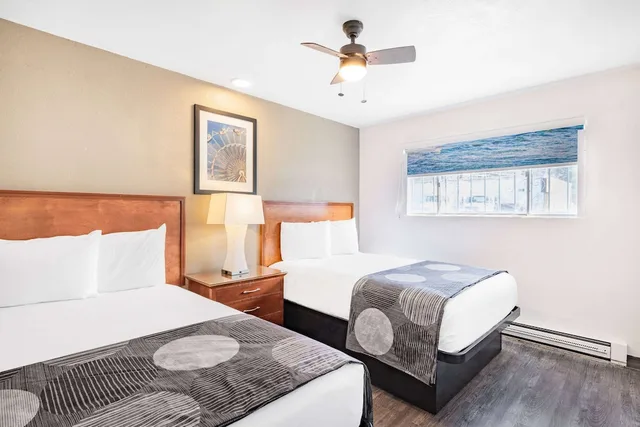 Room, 3 Double Beds, Oceanside Inn and Suites a Days Inn by Wyndham 1/5
