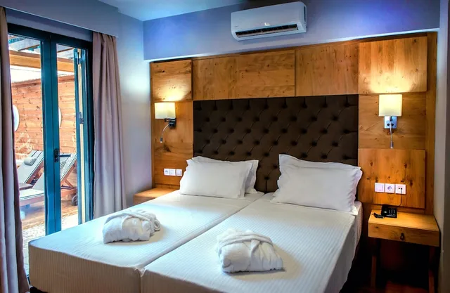 جناح جونيور بسريرين منفصلين مع أريكة، Elmi Suites 1/10