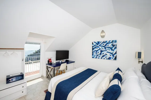 غرفة كلاسيكية بسرير مزدوج بإطلالة على البحر بشرفة بغرفة نوم واحدة، Hotel Villa Gabrisa 1/2